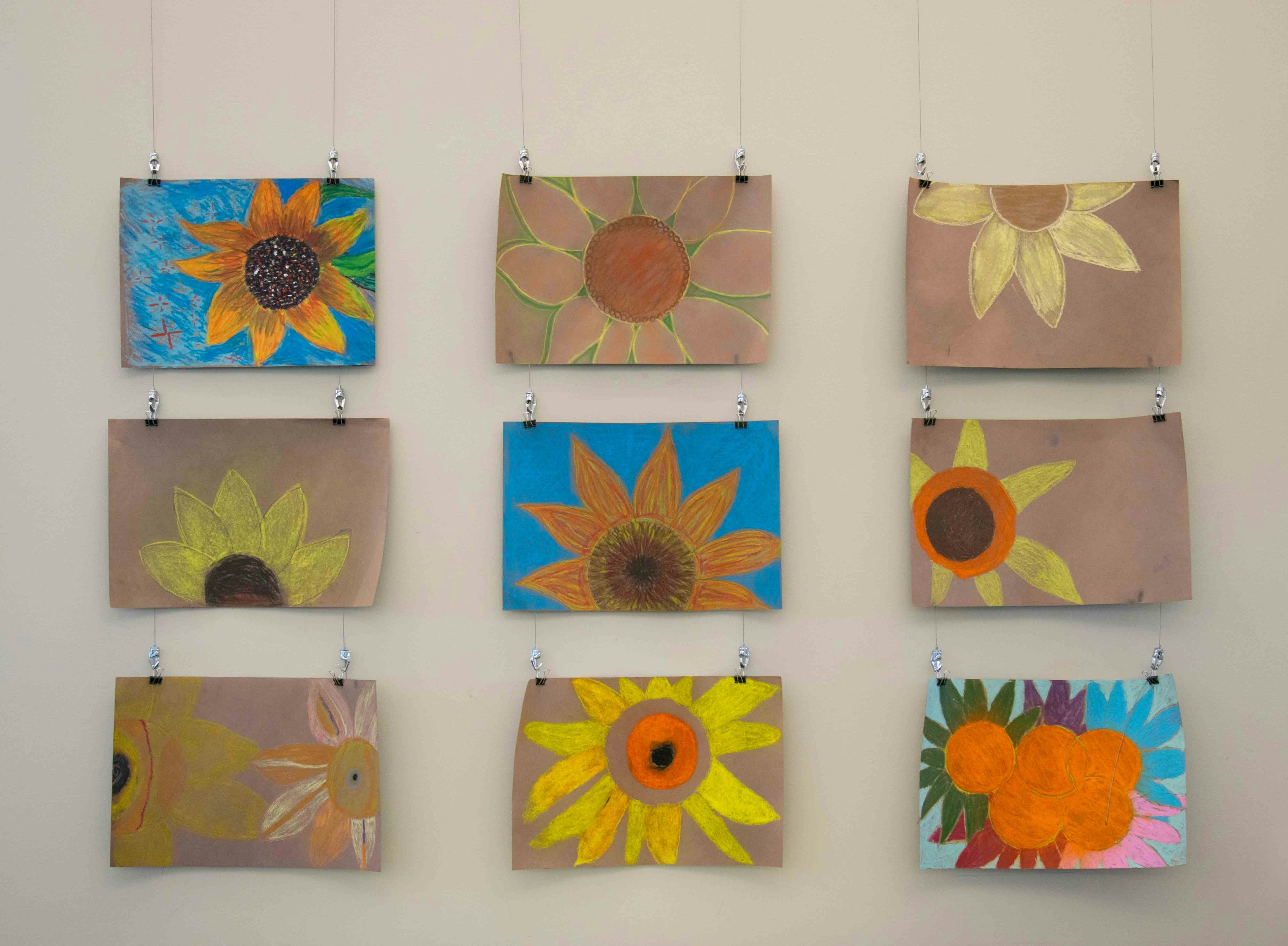 Sunflower and orange artwork.