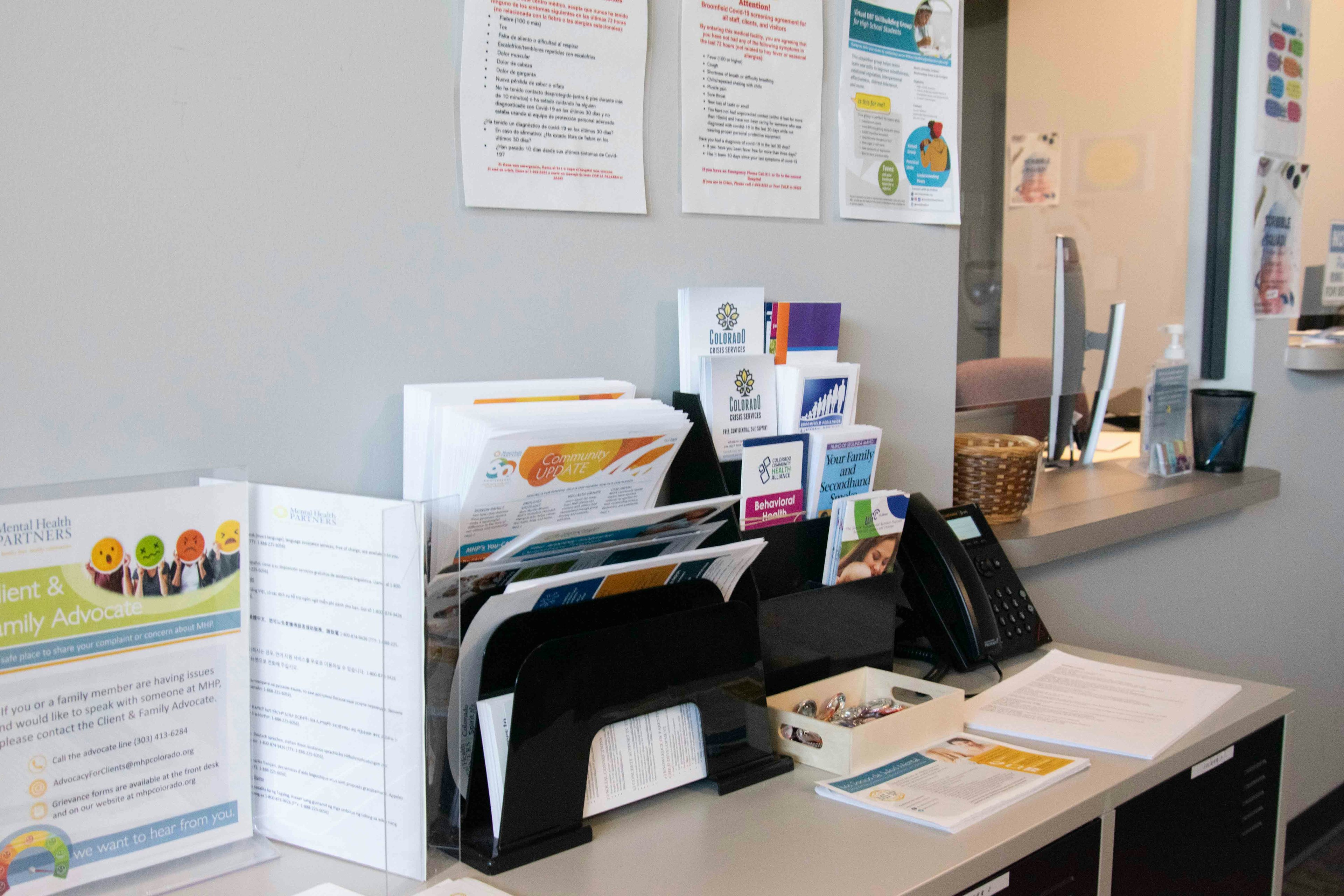 Broomfield office lobby table featuring pamphlets and flyers.